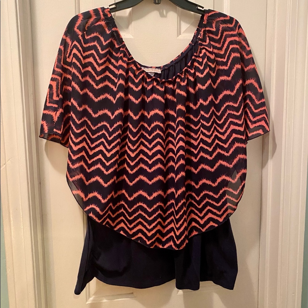 Sleeveless Top with chevron print overlay